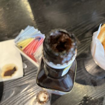 Hennessey's Tavern - a hot dog and a bottle of ketchup - Bars Near Me - Laguna Beach, California