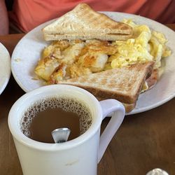 Eggs, ham, potatoes and toast