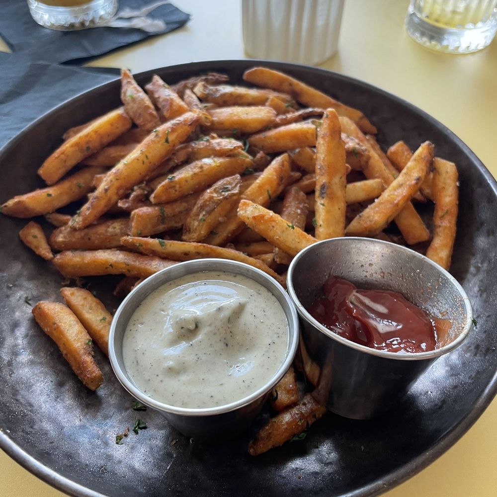 Limestone Rooftop - The truffle fries. Salts and good - cut through the drinks - Lounges Near Me - Austin, Texas