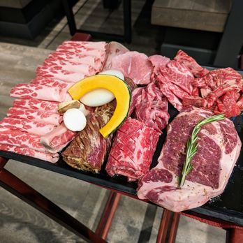 Cow Wow Korean BBQ - Cow Wow Combo Serving for 4. $199.99. Brisket; Boneless, Fresh, and Marinated Short Rib; Ribeye; Pork Neck; Marinated Rib Fingers. + sides. - Korean Near Me - Suwanee, Georgia Cow Wow Korean BBQ - Cow Wow Combo Serving for 4. $199.99. Brisket; Boneless, Fresh, and Marinated Short Rib; Ribeye; Pork Neck; Marinated Rib Fingers. + sides. - Korean Near Me - Suwanee, Georgia