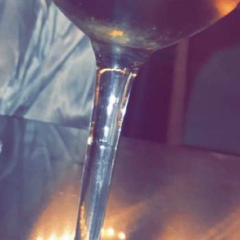 Hot Tin - This is the glass zoomed in. You can see the concentration of the powder at the bottom of the glass. - Cocktail Bars Near Me - New Orleans, Louisiana Hot Tin - This is the glass zoomed in. You can see the concentration of the powder at the bottom of the glass. - Cocktail Bars Near Me - New Orleans, Louisiana