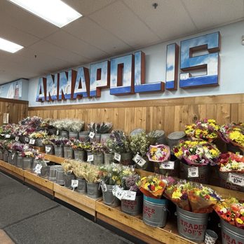 Trader Joe's - Wall of fresh flowers and the city name ANNAPOLIS that welcomes you - Grocery Near Me - Annapolis, Maryland