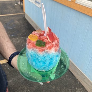 Ice Caps Shave Ice - a man holding a cake - Shaved Ice Near Me - Wichita, Kansas Ice Caps Shave Ice - a man holding a cake - Shaved Ice Near Me - Wichita, Kansas