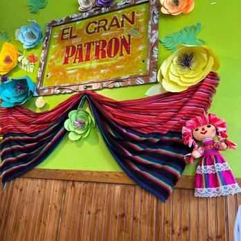 El Gran Patron - a sign with paper flowers on it - Mexican Near Me - Natural Bridge, New York El Gran Patron - a sign with paper flowers on it - Mexican Near Me - Natural Bridge, New York