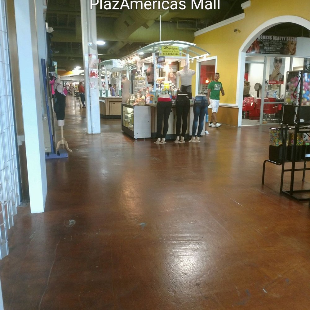 Renovated store with a handful of shoppers Renovated store with a handful of shoppers