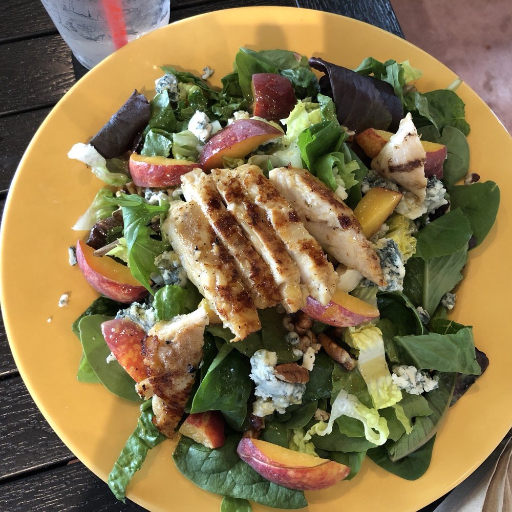 Salad with grilled chicken breast and fresh local peaches at Lady Bird Lane Cafe at the Science Mill Salad with grilled chicken breast and fresh local peaches at Lady Bird Lane Cafe at the Science Mill