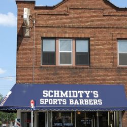 Schmidty's Sports Barbers - Right on the corner! Easy street parking, and super quiet area.