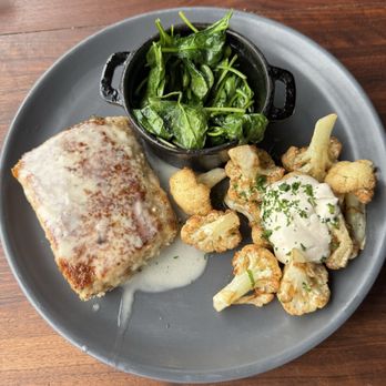 King's Fish House - Orange - Lemon Nut Crusted Wild Mexican Sea Bass, Sautéed Fresh Spinach, Flash-fried Cauliflower - Seafood Near Me - Orange, California
