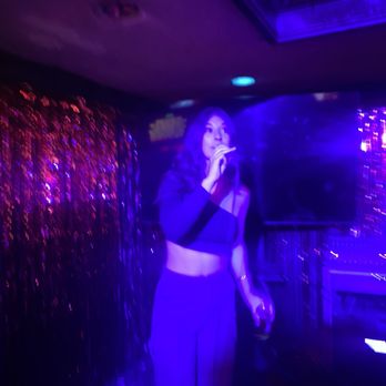 The GasLite - a woman singing into a microphone - Karaoke Near Me - Santa Monica, California The GasLite - a woman singing into a microphone - Karaoke Near Me - Santa Monica, California