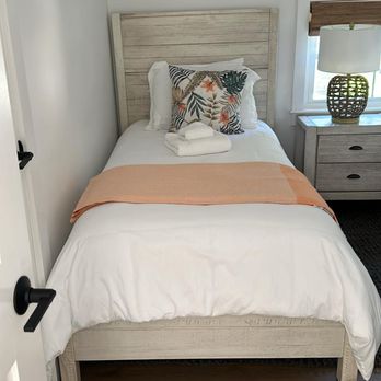 Kimberly's Home Services - a bed in a bedroom - Home Cleaning Near Me - Hyannis, Massachusetts