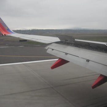 Southwest Airlines - Touching down on the tarmac at PDX, with the thrust reversers and flaps at work - Airlines Near Me - Dallas, Texas Southwest Airlines - Touching down on the tarmac at PDX, with the thrust reversers and flaps at work - Airlines Near Me - Dallas, Texas