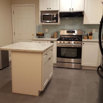 Quality Construction - a clean kitchen with stainless steel appliances - General Contractors Near Me - San Jose, California