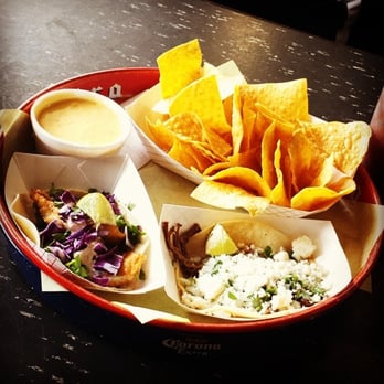 Rusty Taco - clockwise from the top: chips&queso, brisket taco, fried fish taco - Tex-Mex Near Me - Plano, Texas
