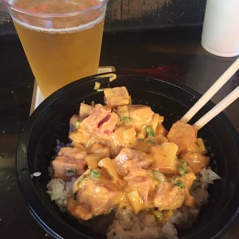 Cuckoo Coconuts Waikiki - Long board and spicy ahi poke bowl - Cocktail Bars Near Me - Honolulu, Hawaii