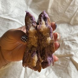 Taro ube bread. Purple bread with taro inside. Not too sweet. Taro ube bread. Purple bread with taro inside. Not too sweet.