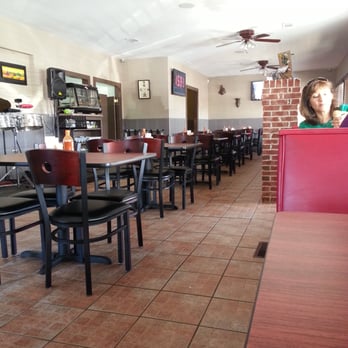 Pimentón Parrilla & Bar - Booths on the side and tables down center. - Bars Near Me - Buford, Georgia Pimentón Parrilla & Bar - Booths on the side and tables down center. - Bars Near Me - Buford, Georgia