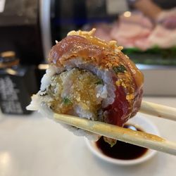 Mizu Sushi - Hudson Bridge Roll $14 Spicy shrimp, jalapeno, crunch, wrapped inside, topped with hot pepper tuna with chef's special sauce