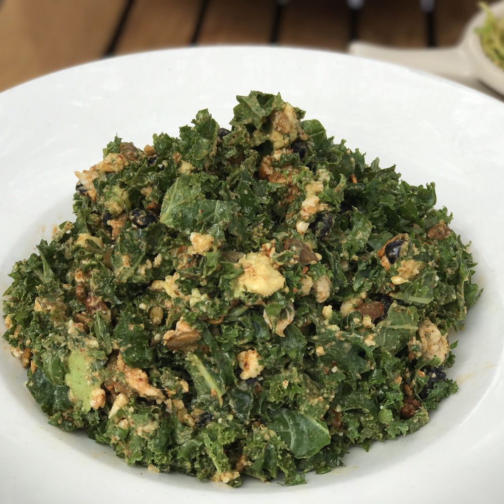 Vinaigrette - Yummy chopped kale, pepitas, chicken and cheese with a southwestern flavor - Salad Near Me - Austin, Texas Vinaigrette - Yummy chopped kale, pepitas, chicken and cheese with a southwestern flavor - Salad Near Me - Austin, Texas
