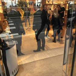 Louis Vuitton - Staff won't let in customers before closing time.