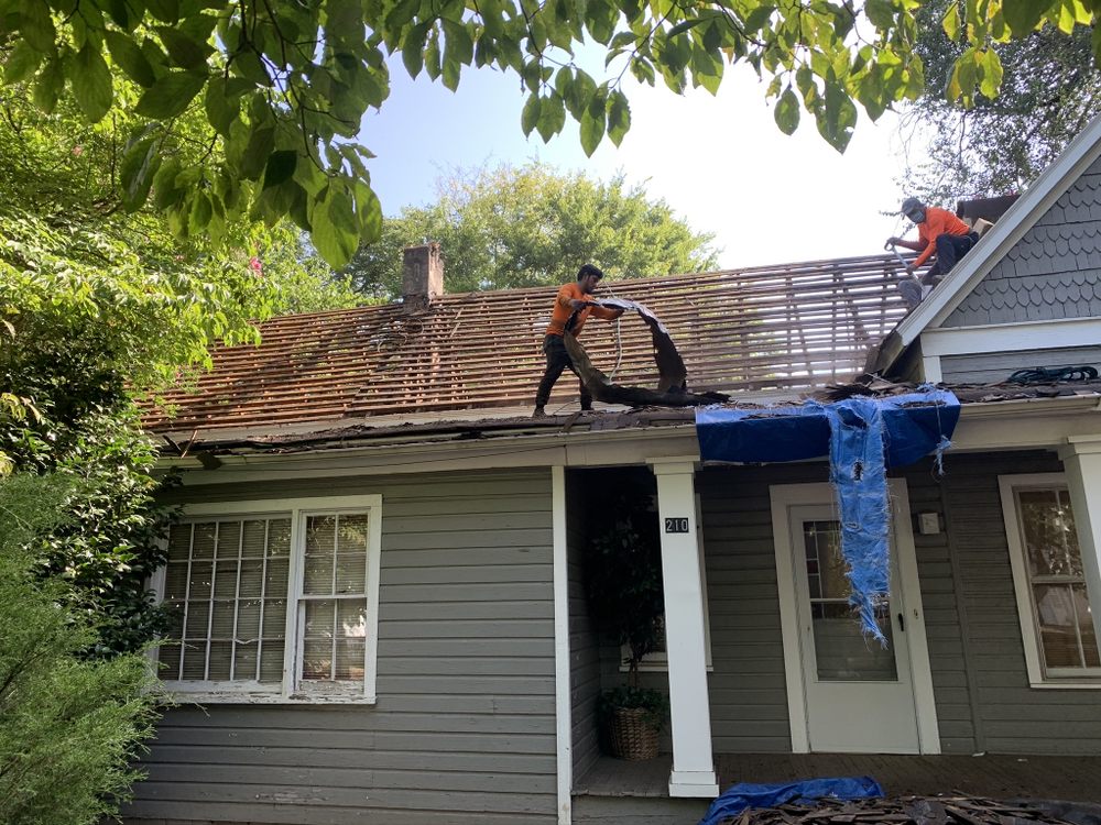 Slide of Noland Roofing