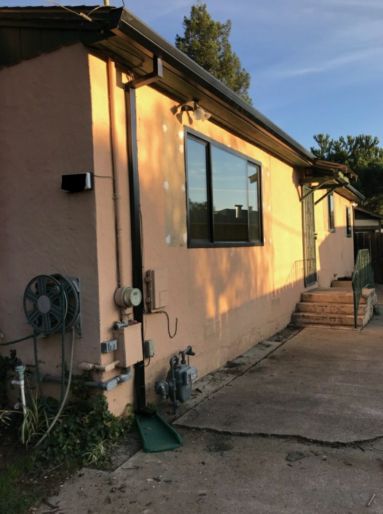 Slide of Signature Rain Gutters & Metal Works