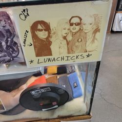 Langlitz Leathers - Autographed picture of one of the Lunachicks wearing Langlitz leather!