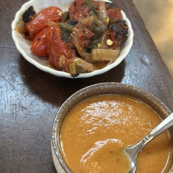 Mezquite - Roasted tomatoes and sauce came together with Bistec plate - Cocktail Bars Near Me - San Antonio, Texas