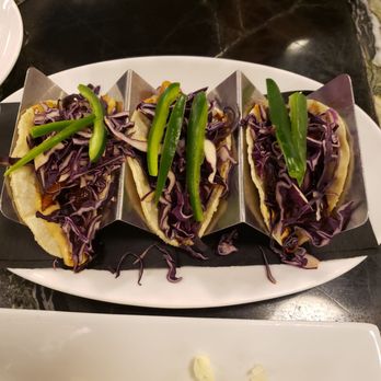 Revolution - Pork Belly Tacos. Three per order. - German Near Me - Morristown, New Jersey
