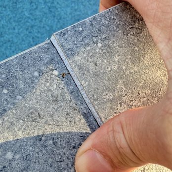 Regal Pools - Tile popping up - Pool & Hot Tub Service Near Me - Tomball, Texas