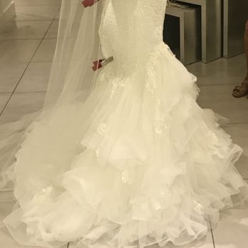 La Vie En Blanc - This is the back of my actual dress, which the seamstress said coudn't be fixed bc the tulle was damaged when they dry cleaned it - Bridal Near Me - Miami, Florida La Vie En Blanc - This is the back of my actual dress, which the seamstress said coudn't be fixed bc the tulle was damaged when they dry cleaned it - Bridal Near Me - Miami, Florida