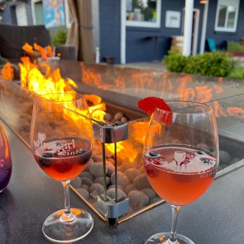 WineGirl Wines - Firepit and wine outdoors in covered patio area - Wineries Near Me - Manson, Washington WineGirl Wines - Firepit and wine outdoors in covered patio area - Wineries Near Me - Manson, Washington