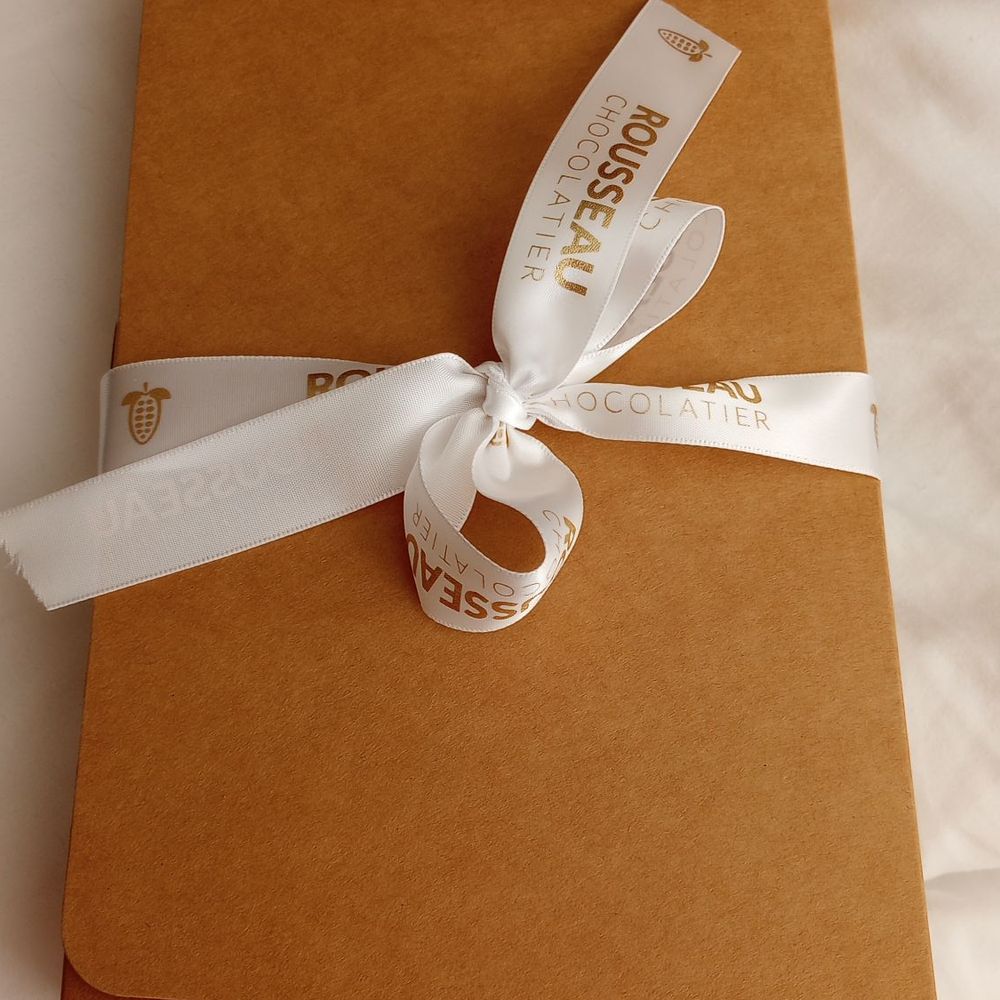 Rousseau Chocolatier - a gift wrapped in brown paper - Chocolatiers & Shops Near Me - Halifax, Nova Scotia