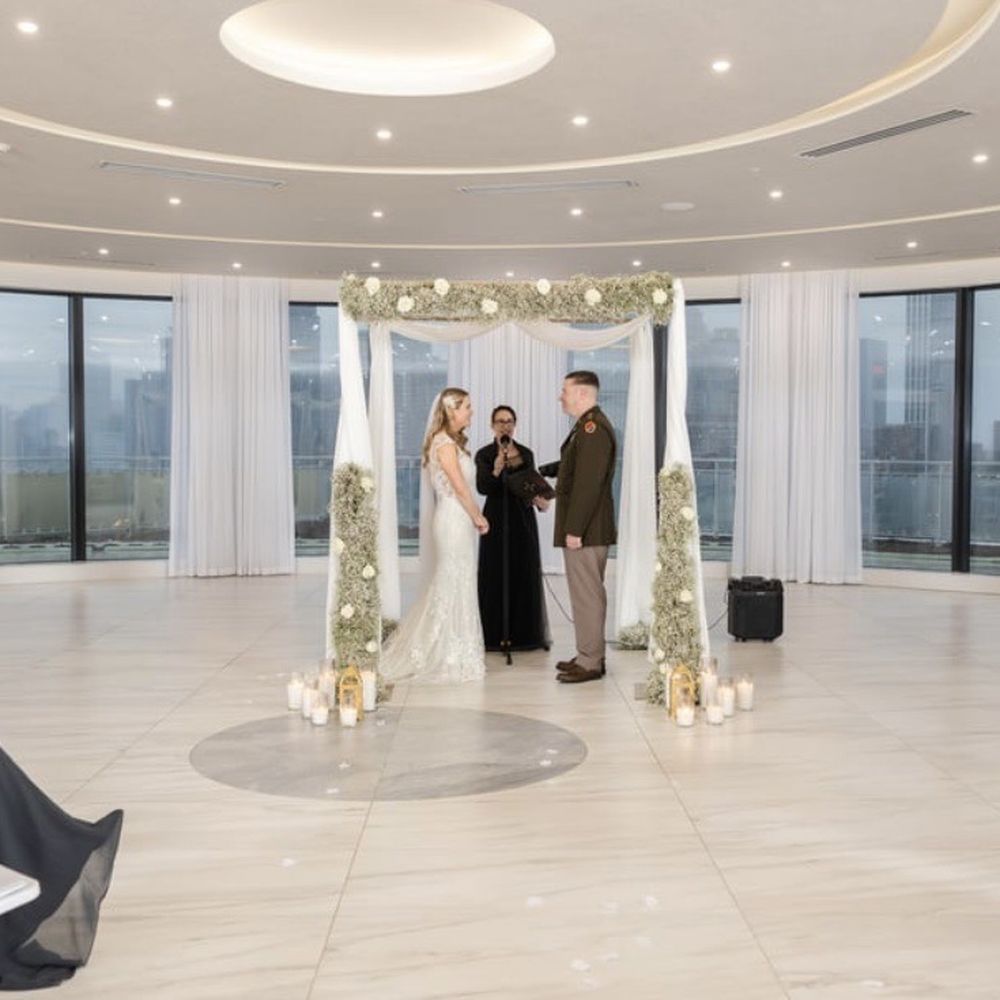 Chuppah from Mr and Mrs Chuppah: gold piping and fabric supplied by vendor plus our floral arrangement