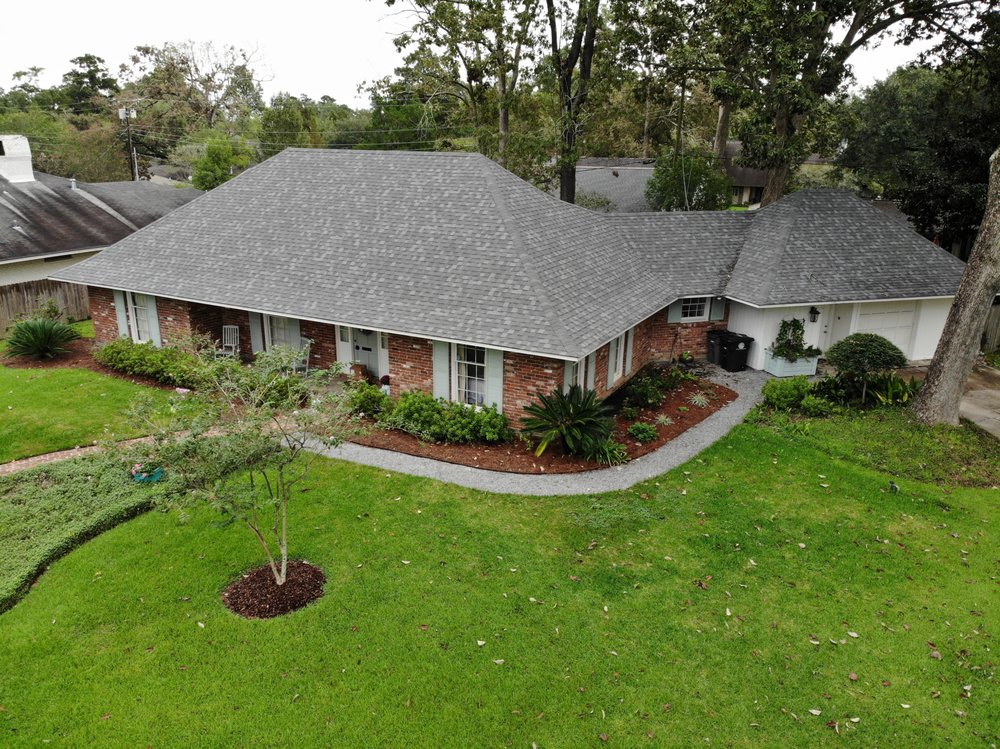 Slide of Mid City Roofing