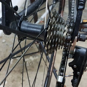 Airdrie Bicycle Services - Rear Deraillieur - chain was not moving up to the lowest (biggest) cog - this was adjusted and the rear mech straightened. - Bike Repair/Maintenance Near Me