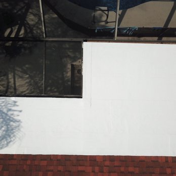 Miller II Roofing Solutions - Flat roof leak repair with our 100% waterproof rubber roof coating. - Roofing Near Me - Tampa, Florida