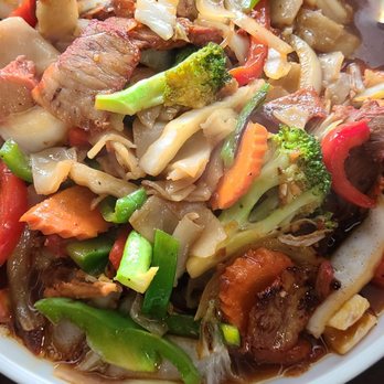Rock-Pho'd - Multicolored pic is ordered rad na and chickem satay. The 3rd pic is my own cook of Thai rad na. - Asian Fusion Near Me - Rockford, Illinois Rock-Pho'd - Multicolored pic is ordered rad na and chickem satay. The 3rd pic is my own cook of Thai rad na. - Asian Fusion Near Me - Rockford, Illinois
