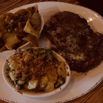 Whiskey Cake Kitchen & Bar - Garlic ribeye, potato and broccolini casserole with a side of roasted mushroom pappardelle - New American Near Me - Katy, Texas Whiskey Cake Kitchen & Bar - Garlic ribeye, potato and broccolini casserole with a side of roasted mushroom pappardelle - New American Near Me - Katy, Texas