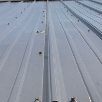 Prominent Construction - crooked screw line, one screw completely missed the board. - Roofing Near Me - Minnetonka, Minnesota
