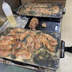 Fulks Run Grocery - The griddle pros frying up the ham