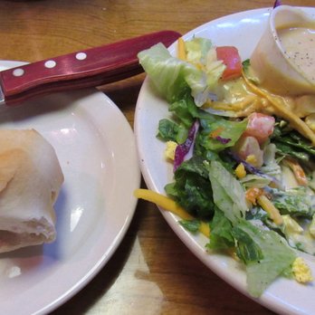 Texas Roadhouse - Warm from the oven rolls and fresh, crisp salad - American Near Me - Ocala, Florida