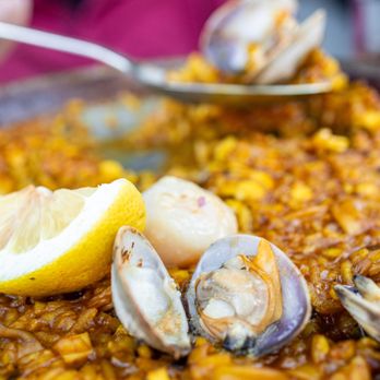 Puerta del Sol - Paella de Mariscos ($44) rich shrimp broth, bomba rice & nora sofrito. Topped with shrimp, monkfish, clam & squid - Tapas/Small Plates Near Me - San Jose, California