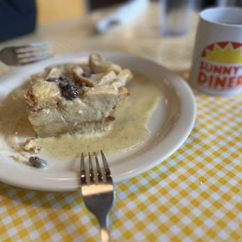 Sunny's Diner Nyberg - Bread pudding with yummy vanilla sauce - Breakfast & Brunch Near Me - Tualatin, Oregon Sunny's Diner Nyberg - Bread pudding with yummy vanilla sauce - Breakfast & Brunch Near Me - Tualatin, Oregon