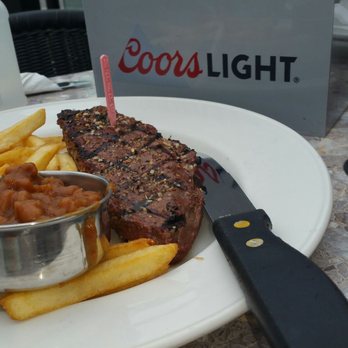 Chuck's Roadhouse - $10 steak with beans and fries - Bars Near Me - Windsor, Ontario