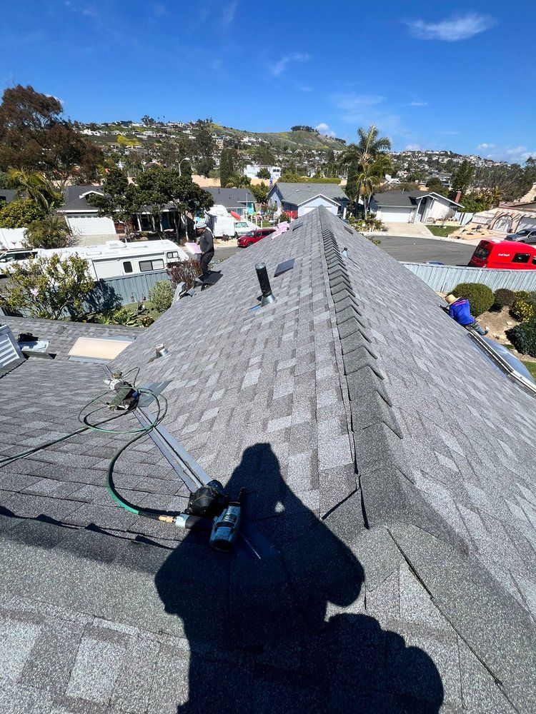 Slide of Alpha Roofing Group