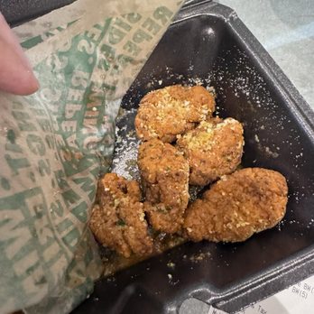 Wingstop - The. Mexican corn flavored bites.   Asked to put sauce on bottom and NOT all over the chicken. - Chicken Wings Near Me - North Augusta, South Carolina