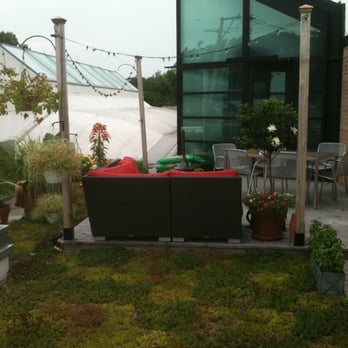 TMC Builders - a patio with a couch and chairs - General Contractors Near Me - Chicago, Illinois TMC Builders - a patio with a couch and chairs - General Contractors Near Me - Chicago, Illinois