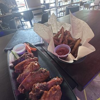 Gristworkz - 6 piece smoked buffalo wings $14 / small order truffle fries $6 recommend both! - Brewpubs Near Me - Houston, Texas