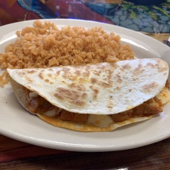 Taco City - Chicken quesadilla at Taco City - looks like I was given extra rice because I didn't want beans. Chicken is dark meat chicken. - Mexican Near Me - Sellersburg, Indiana