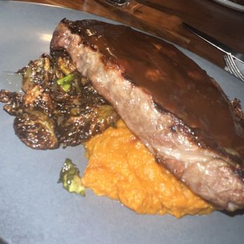 The Monroe - Ribeye w Brussels and sweet potato mash and some weird gravy on the steak - New American Near Me - Orlando, Florida The Monroe - Ribeye w Brussels and sweet potato mash and some weird gravy on the steak - New American Near Me - Orlando, Florida